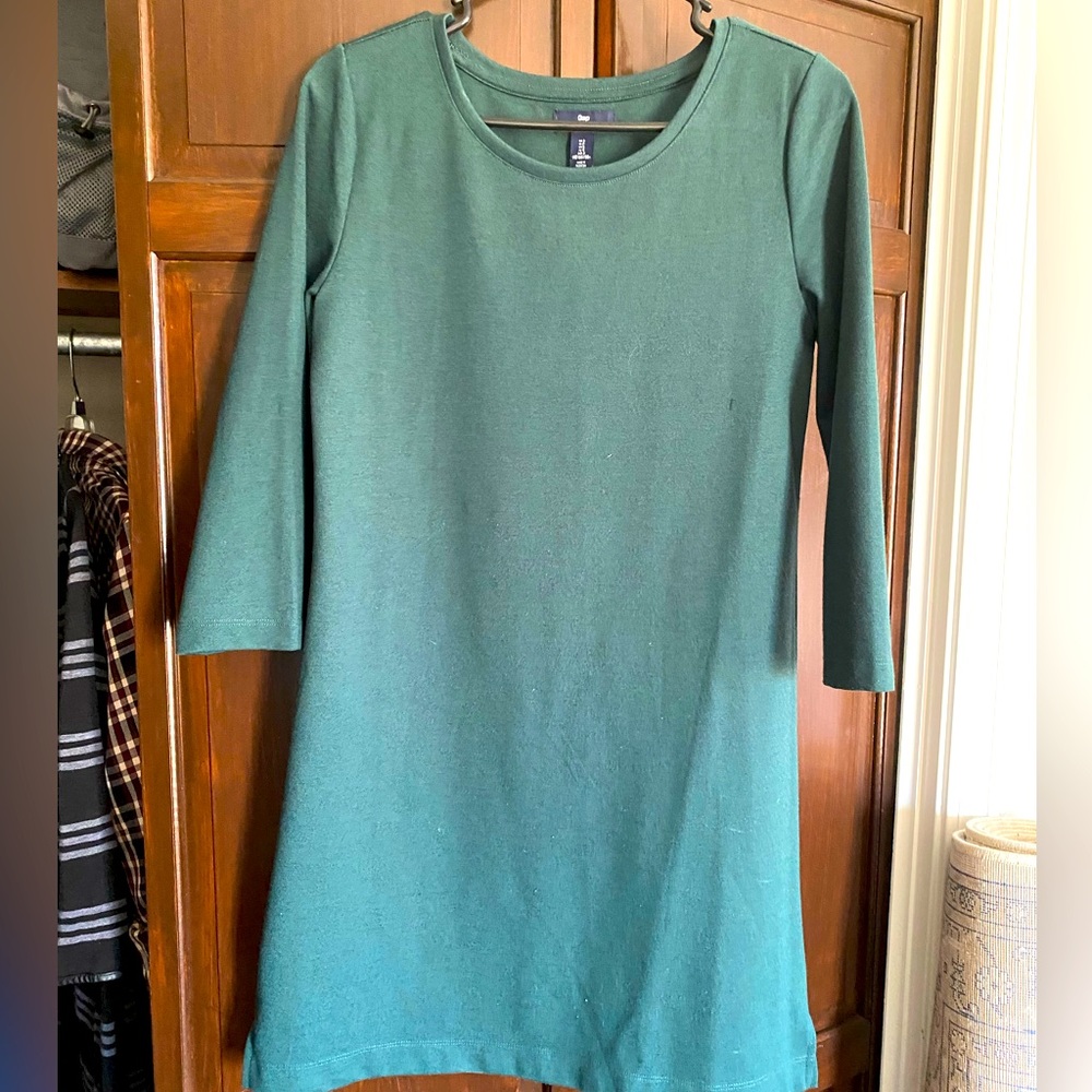 Dark green dress.